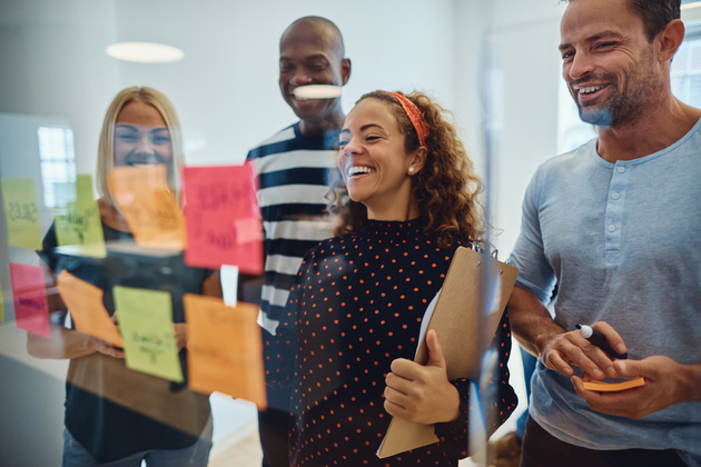Team brainstorming together in an office